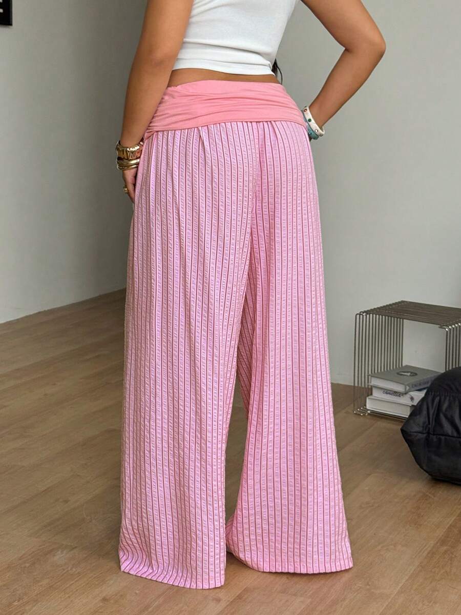 Women's plus size wide leg cotton pants featuring a relaxed loose fit and high waist design.