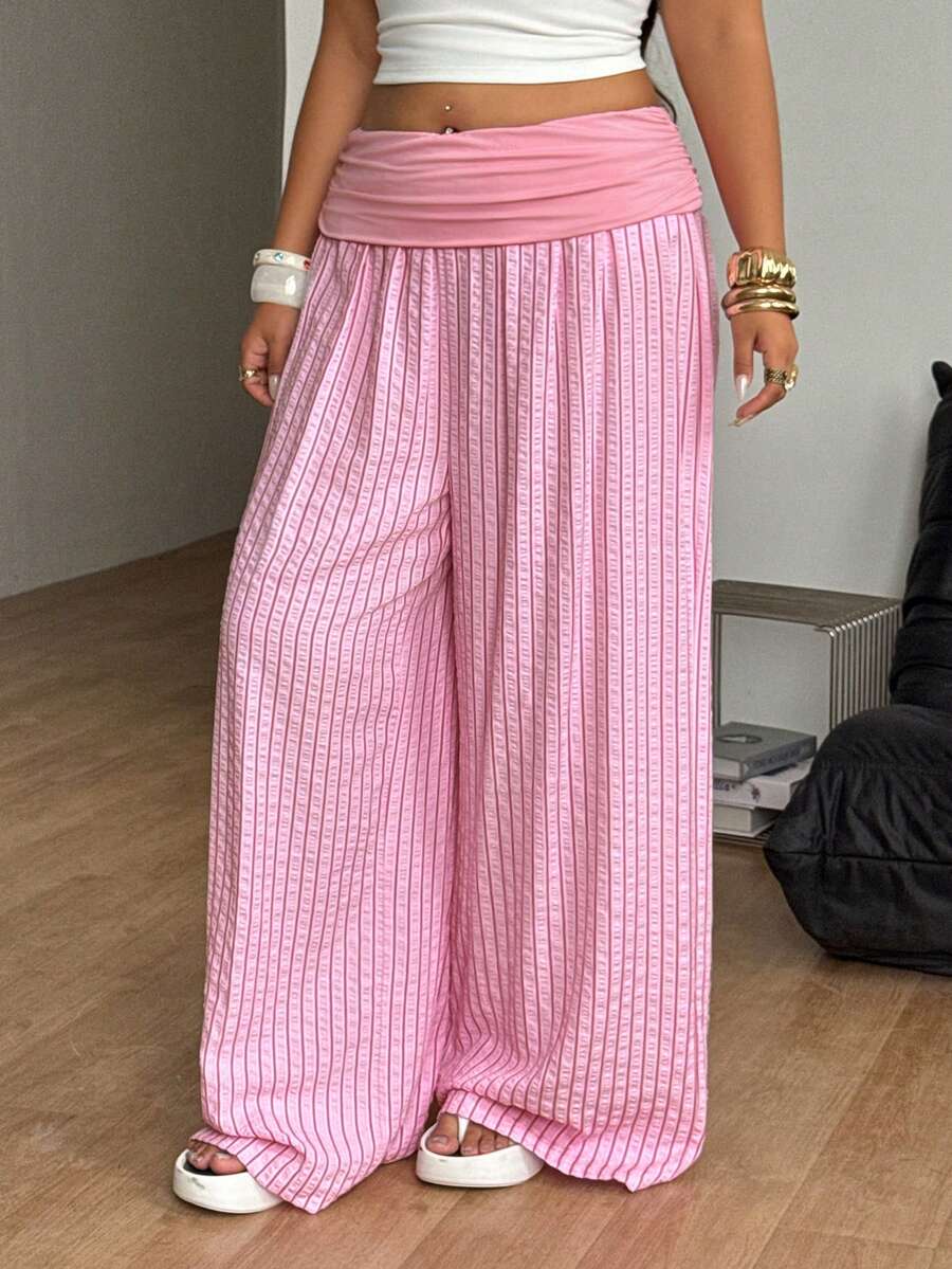 Women's plus size wide leg cotton pants featuring a relaxed loose fit and high waist design.