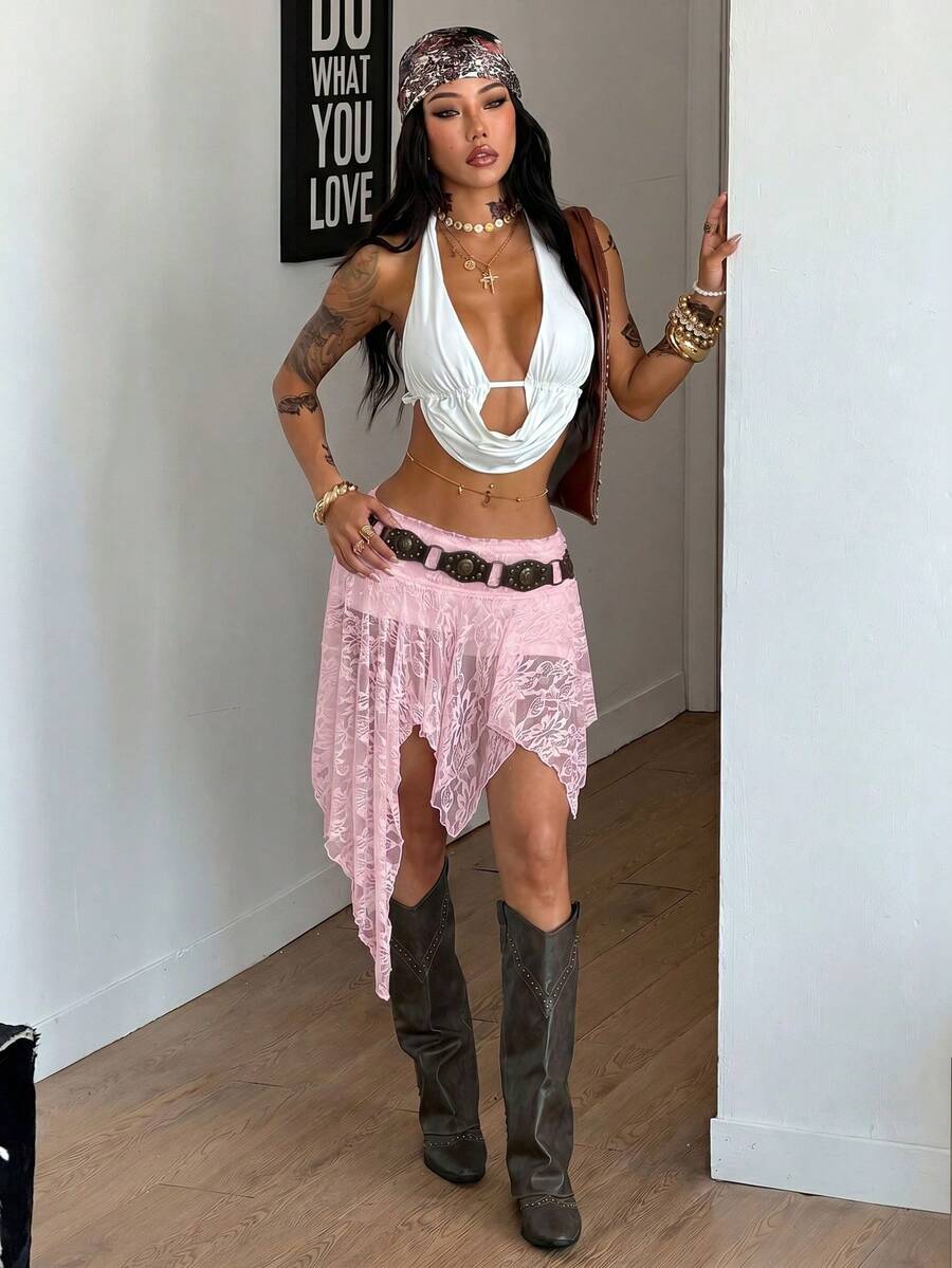 Women's floral lace mini skirt in white with asymmetrical ruffle trim and low waist design.