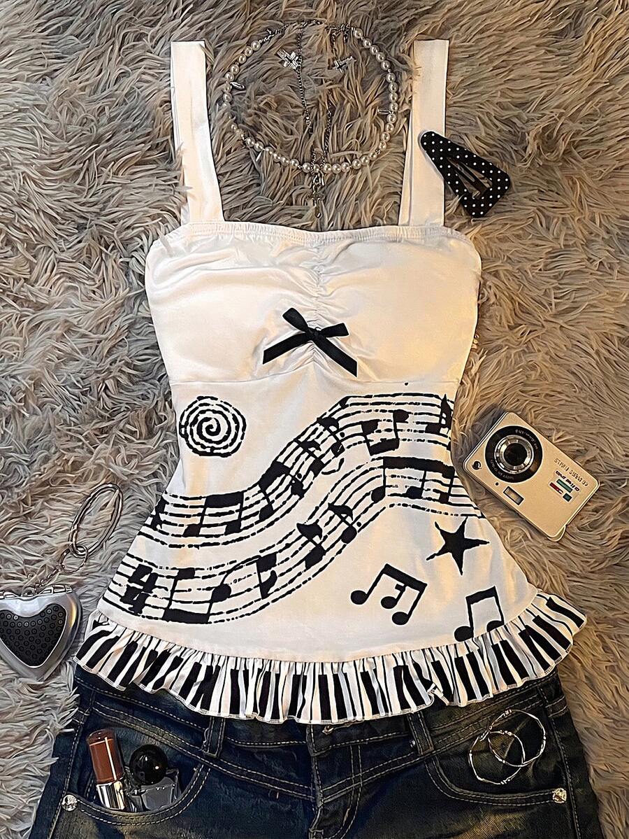 Multicolor Y2K slim fit crop top with wide straps, polka dot print, ruched shirred design, bow accents, and a flared ruffle hem.