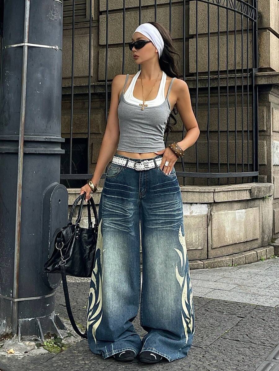 Women's loose wide-leg jeans in light wash denim with low waist and extra-long relaxed fit