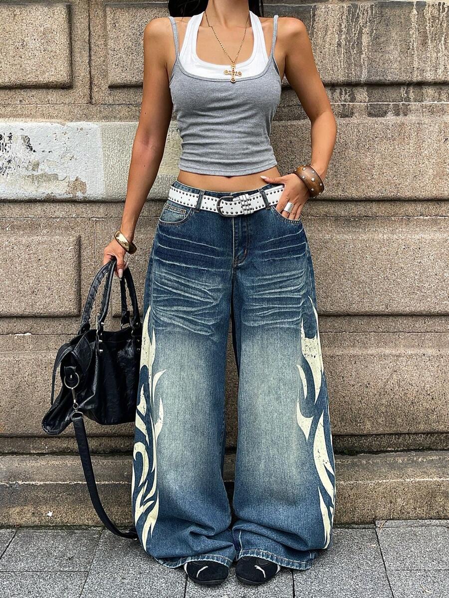 Women's loose wide-leg jeans in light wash denim with low waist and extra-long relaxed fit