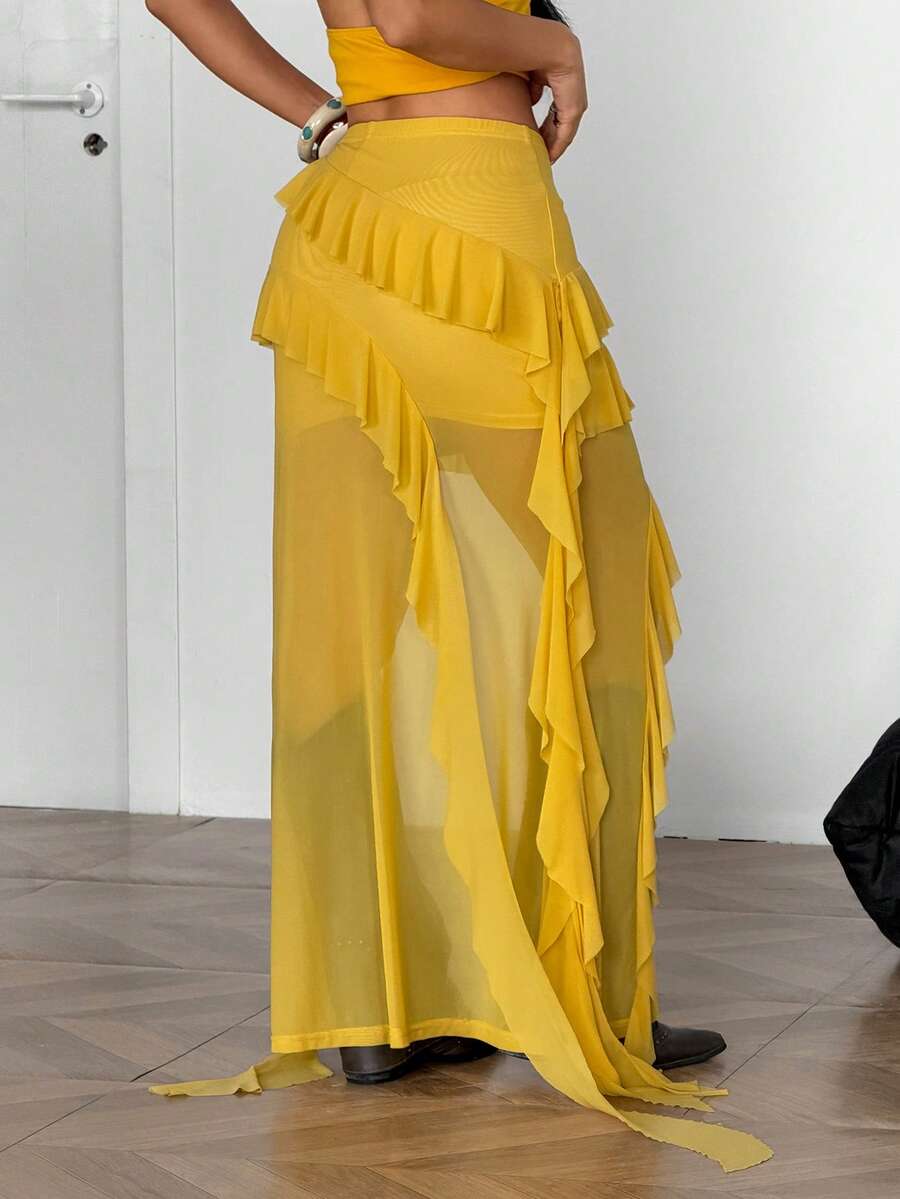 Light yellow asymmetrical ruffle long skirt with a low-rise waist and stretch knit fabric.