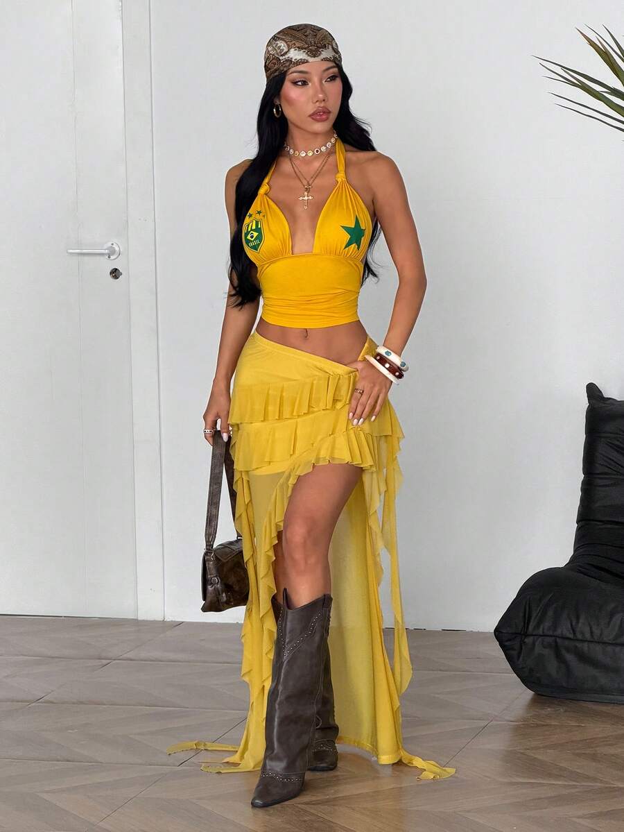 Light yellow asymmetrical ruffle long skirt with a low-rise waist and stretch knit fabric.