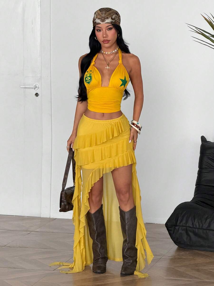Light yellow asymmetrical ruffle long skirt with a low-rise waist and stretch knit fabric.