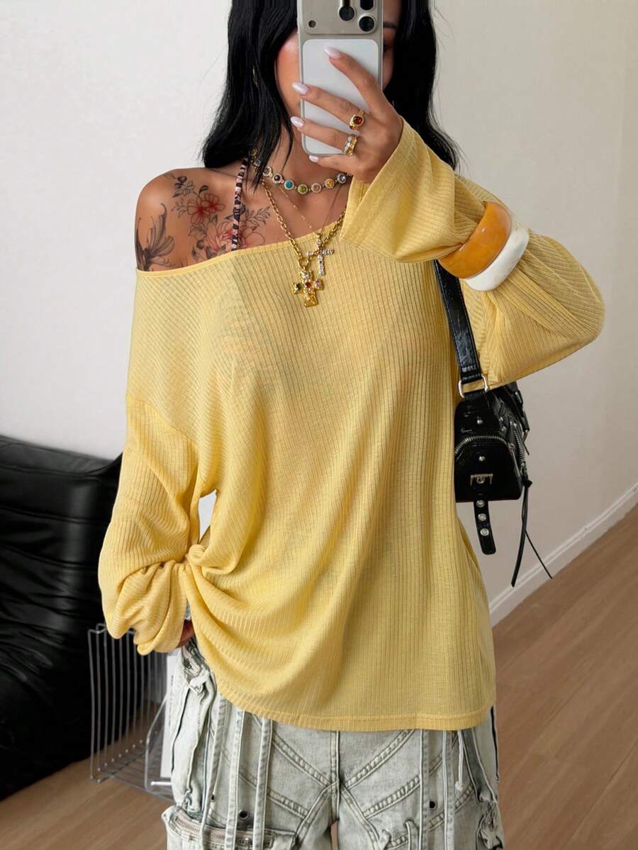 Women's brown striped boat neck long sleeve raglan T-shirt with a loose casual fit