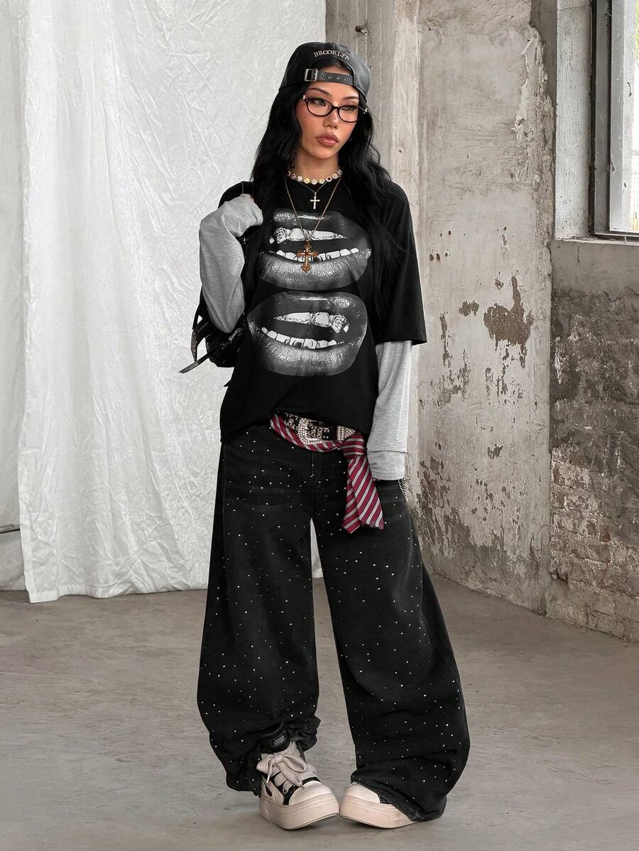 Women's casual graphic long sleeve t-shirt with a round neck, drop shoulder sleeves, and loose relaxed fit.