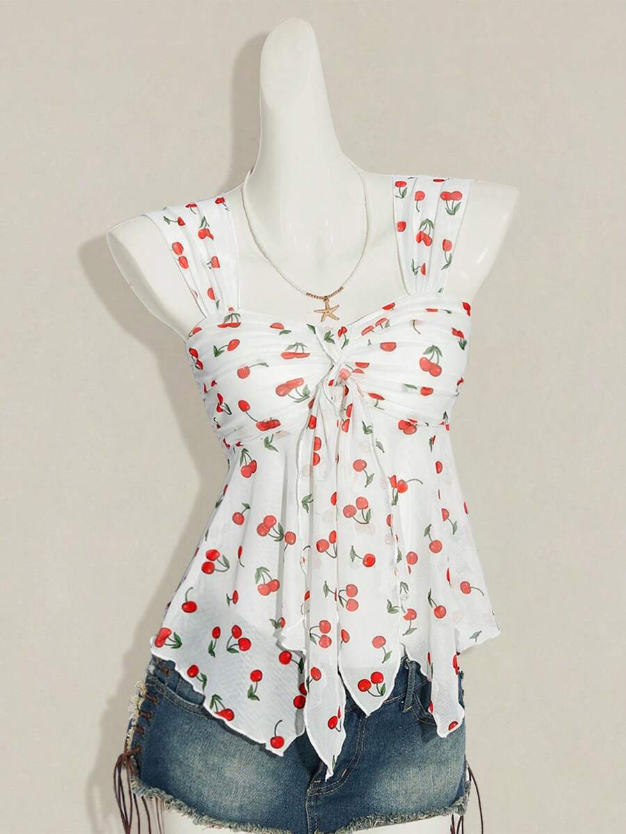 Women's white cherry print cami top with wide straps, ruched knot detail, and an asymmetrical hem