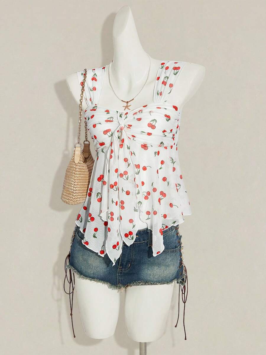 Women's white cherry print cami top with wide straps, ruched knot detail, and an asymmetrical hem
