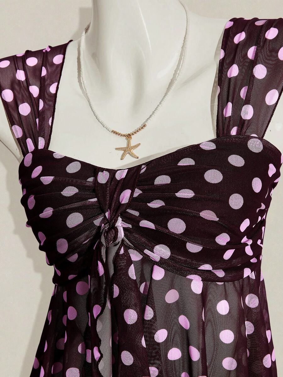 Women's white cherry print cami top with wide straps, ruched knot detail, and an asymmetrical hem