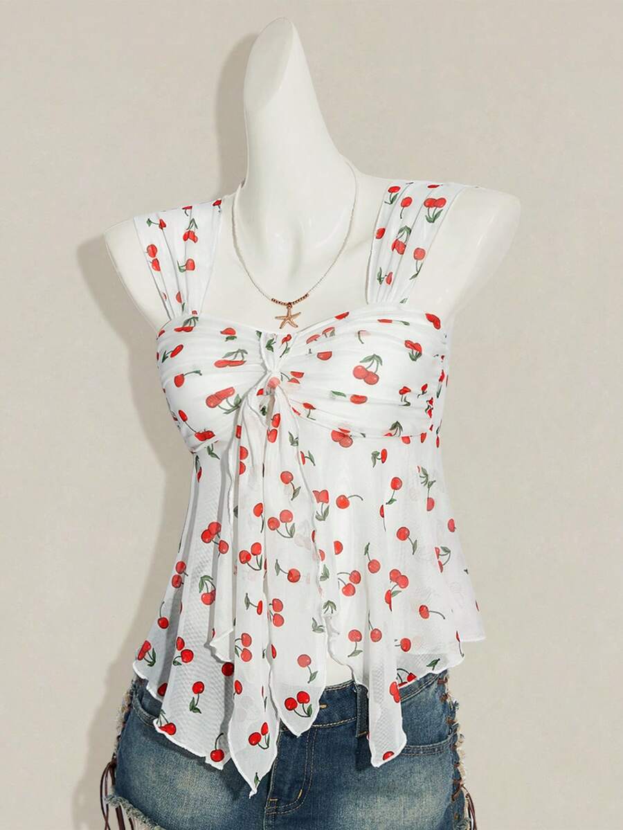 Women's white cherry print cami top with wide straps, ruched knot detail, and an asymmetrical hem