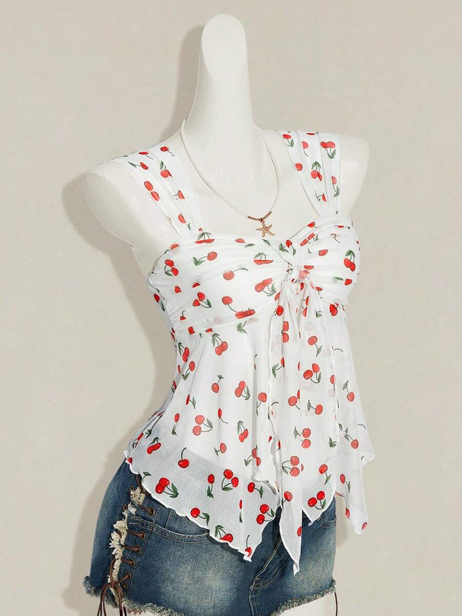 Women's white cherry print cami top with wide straps, ruched knot detail, and an asymmetrical hem