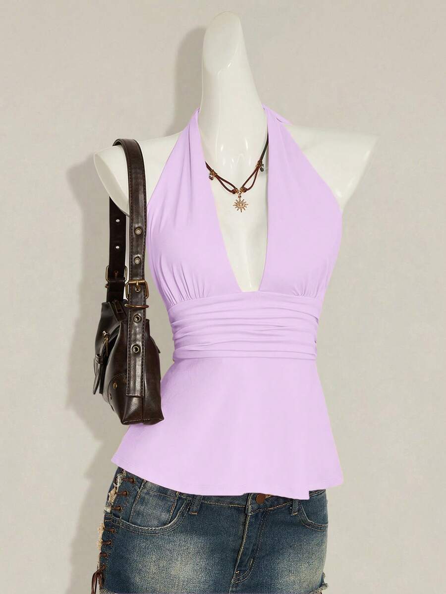 Women's backless halter babydoll tank top featuring a square neckline, slim fit silhouette, and a flared ruffle hem.
