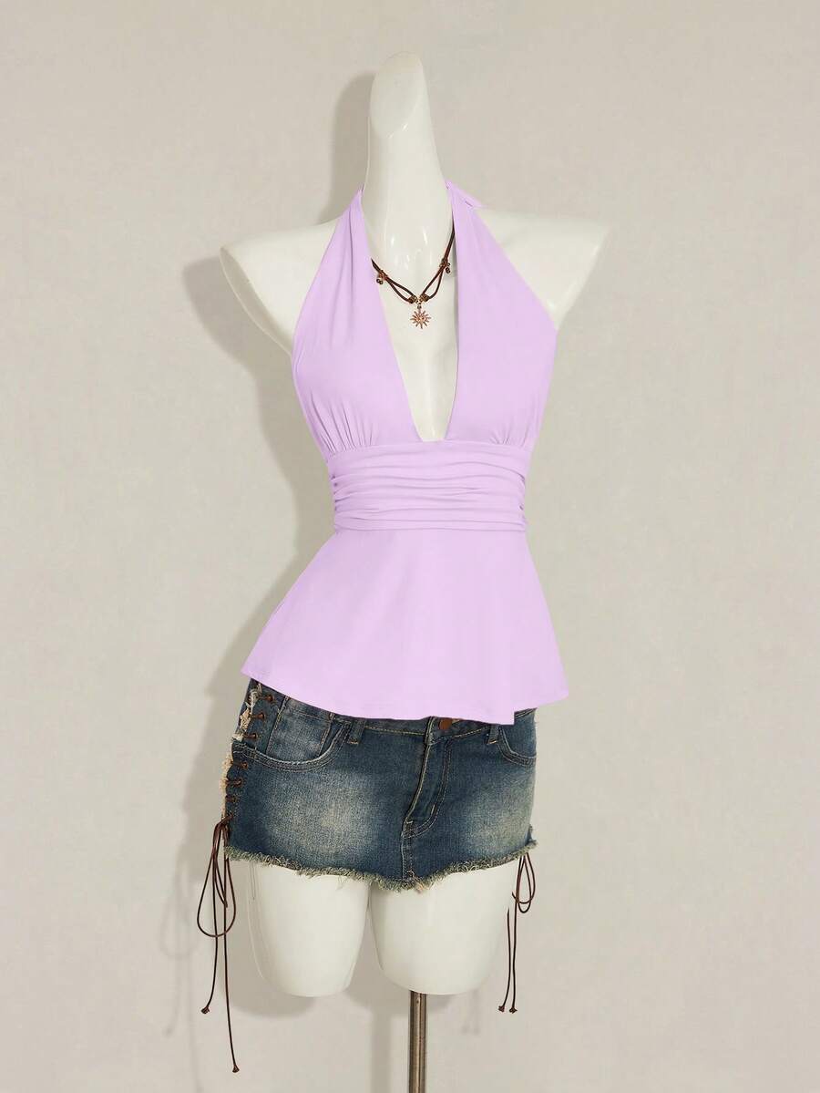 Women's backless halter babydoll tank top featuring a square neckline, slim fit silhouette, and a flared ruffle hem.
