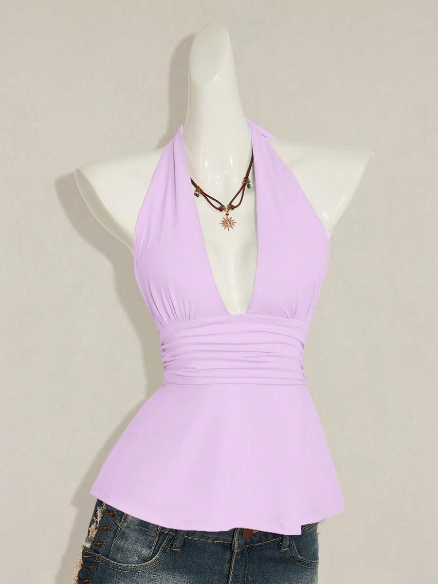Women's backless halter babydoll tank top featuring a square neckline, slim fit silhouette, and a flared ruffle hem.