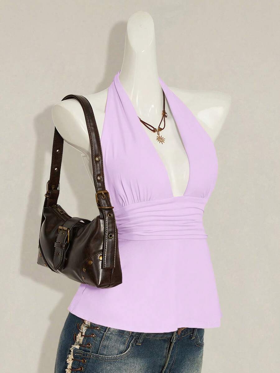 Women's backless halter babydoll tank top featuring a square neckline, slim fit silhouette, and a flared ruffle hem.