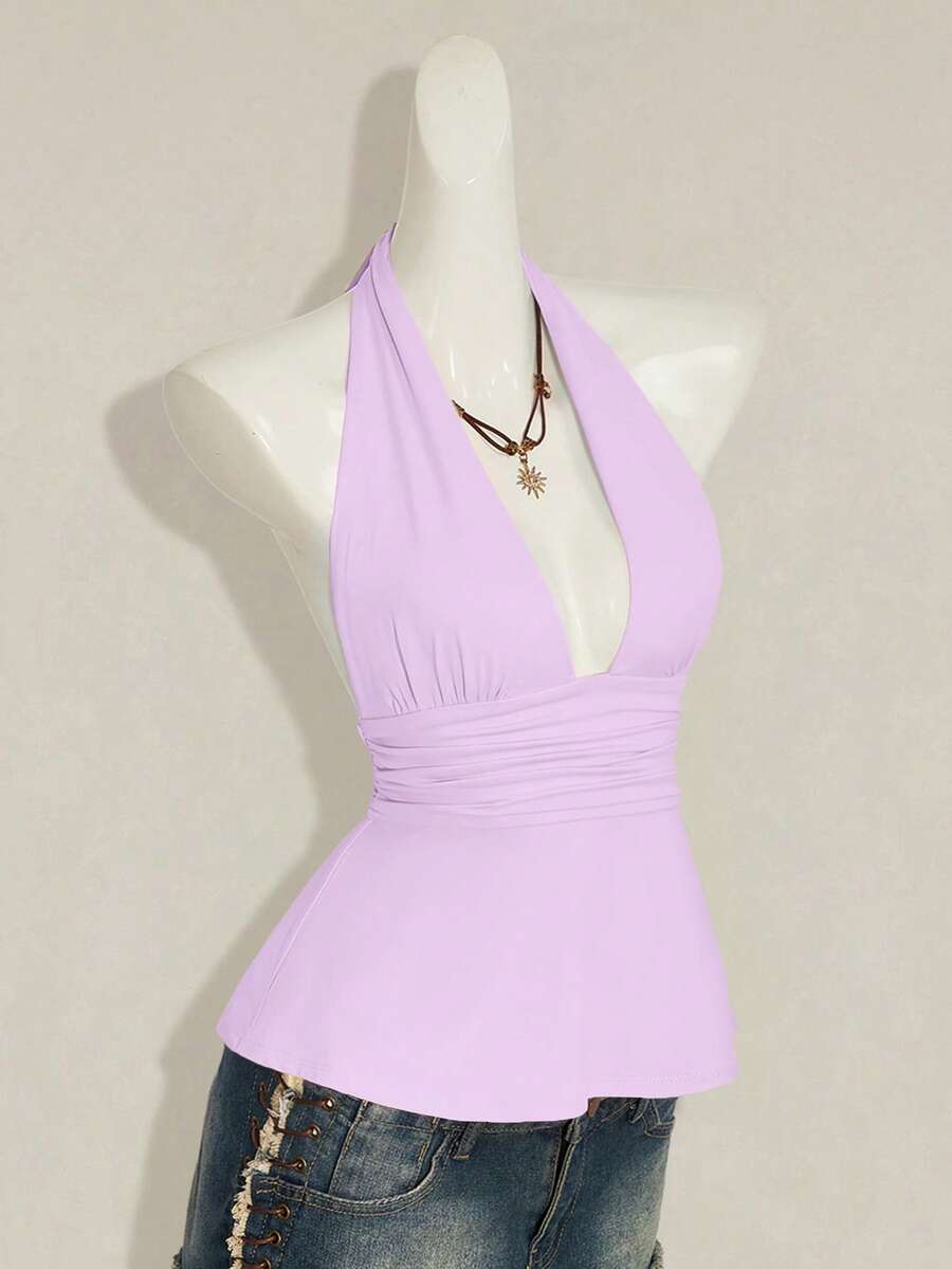 Women's backless halter babydoll tank top featuring a square neckline, slim fit silhouette, and a flared ruffle hem.