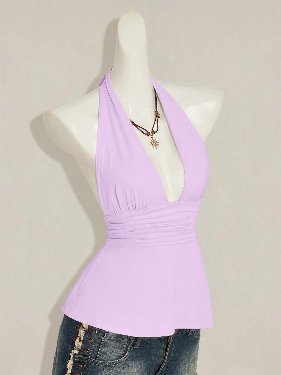 Women's backless halter babydoll tank top featuring a square neckline, slim fit silhouette, and a flared ruffle hem.
