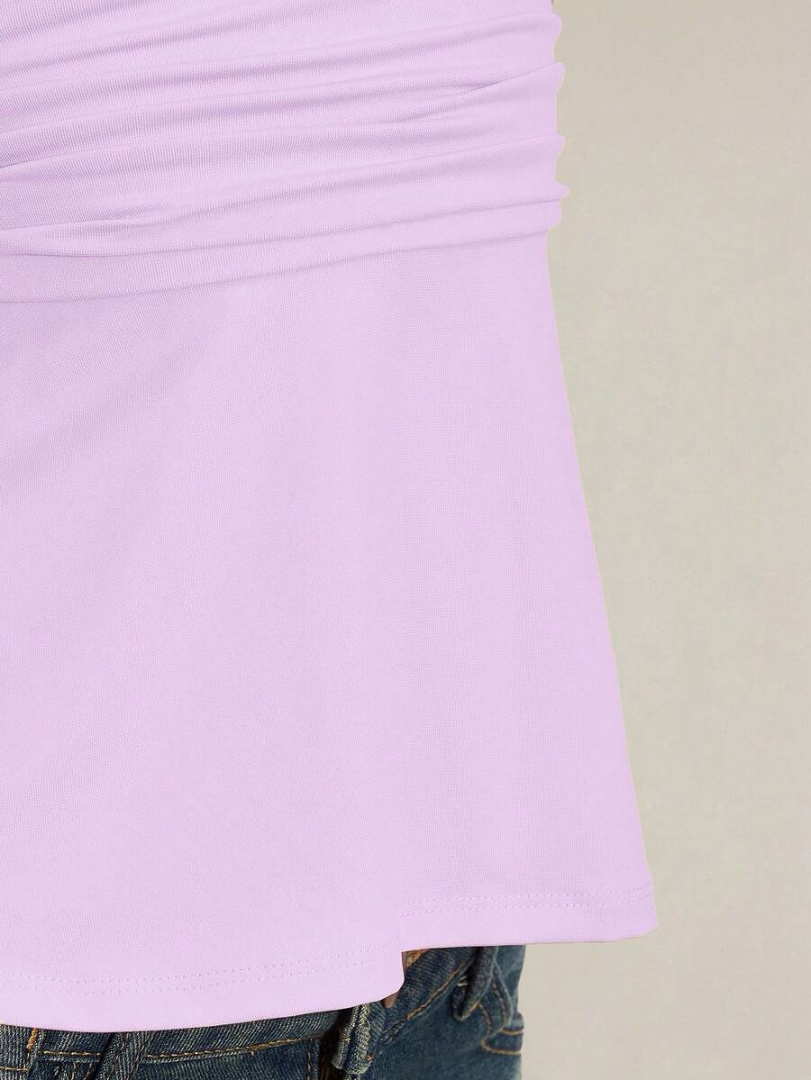 Women's backless halter babydoll tank top featuring a square neckline, slim fit silhouette, and a flared ruffle hem.