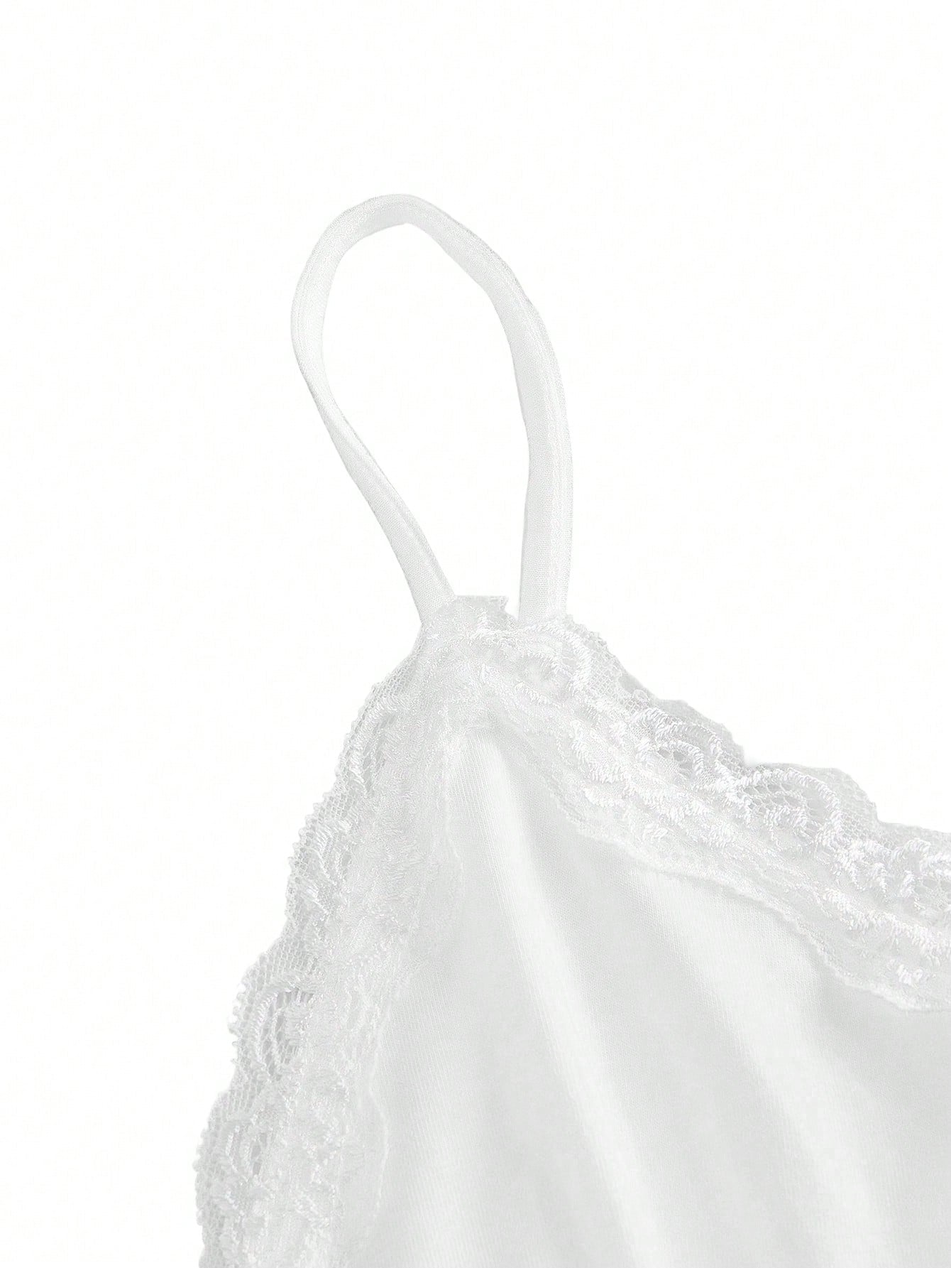 Women's spaghetti strap camisole with contrast lace patchwork, slim fit silhouette, plain design, and flared hem.