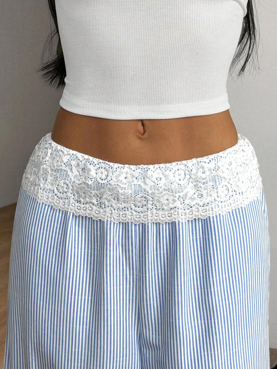 Women's loose fit straight leg lounge pants in textured knit fabric featuring an elastic drawstring waist and side pockets