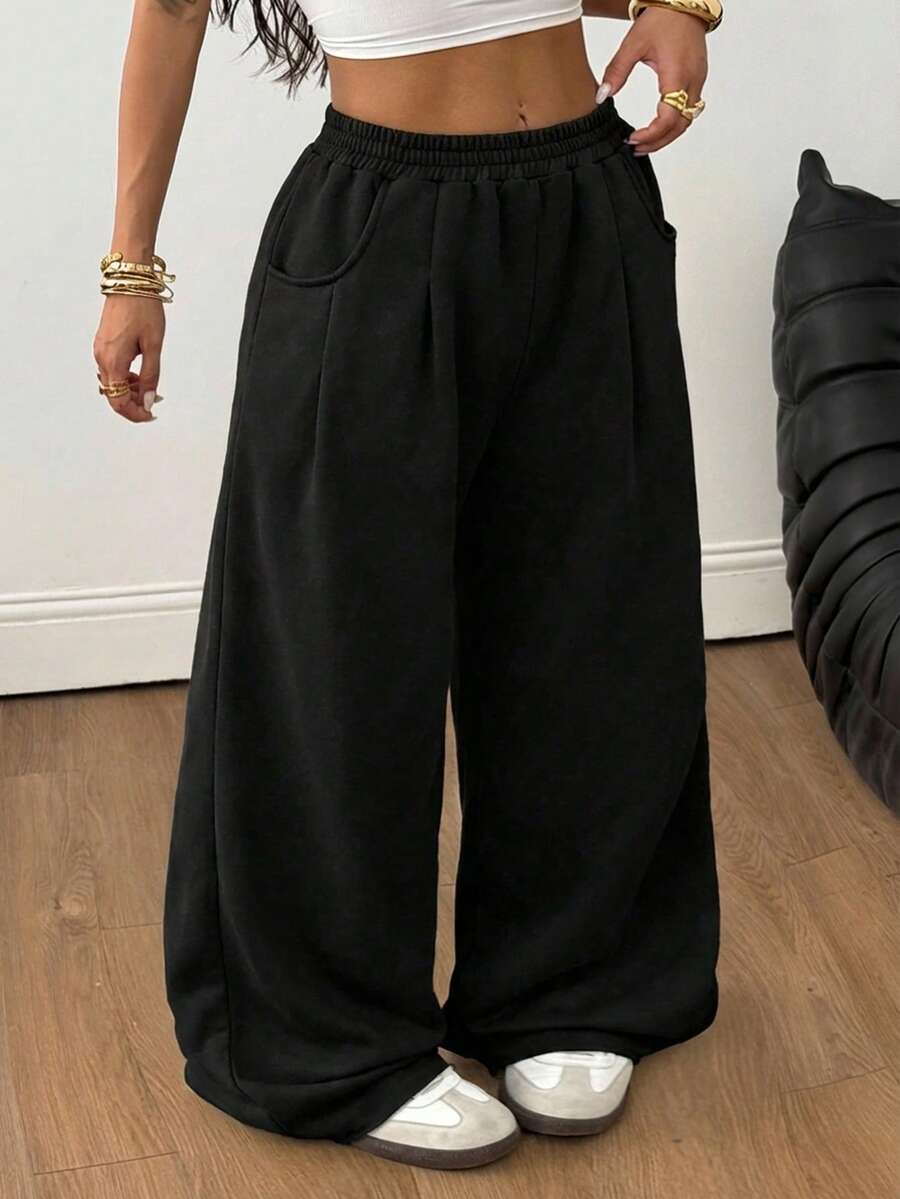Women's loose wide leg casual sweatpants with an elastic waistband and side pockets