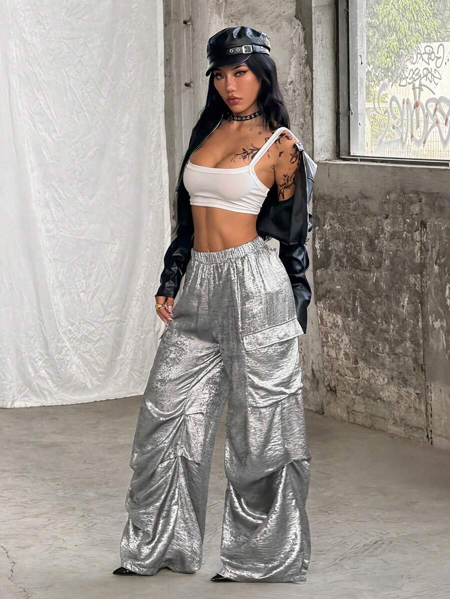 Women's high waist wide leg cargo pants featuring a black and white tree branch print and adjustable drawstring closure.