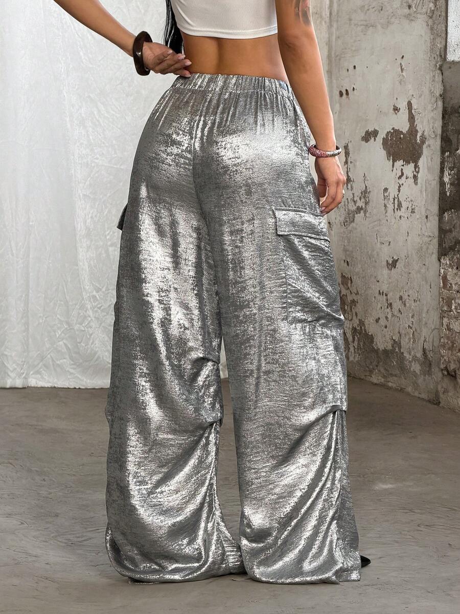 Women's high waist wide leg cargo pants featuring a black and white tree branch print and adjustable drawstring closure.