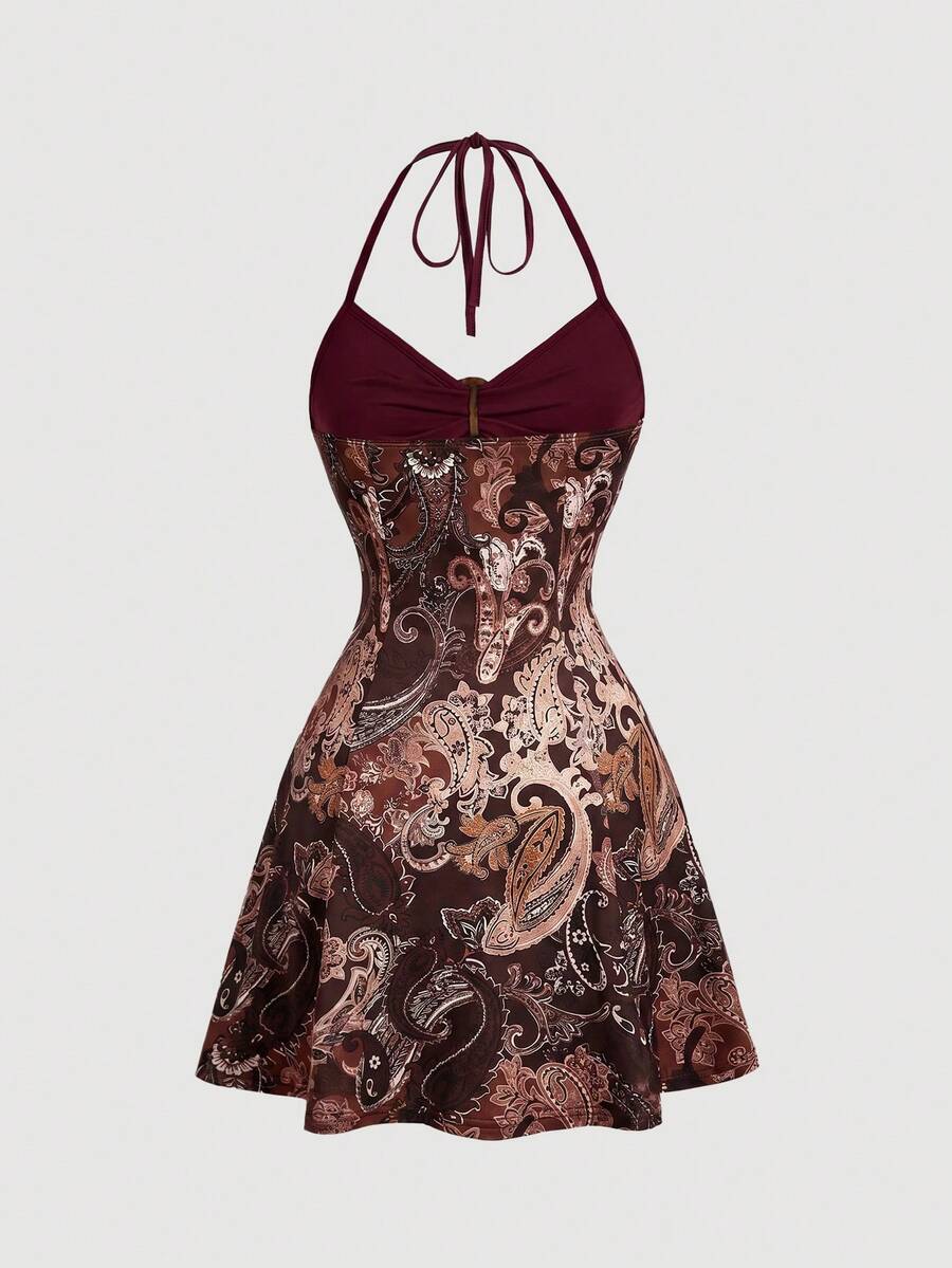 Women's apricot halter mini dress with backless knot and ring detail, sleeveless cami style, flared hem, and boho vacation look
