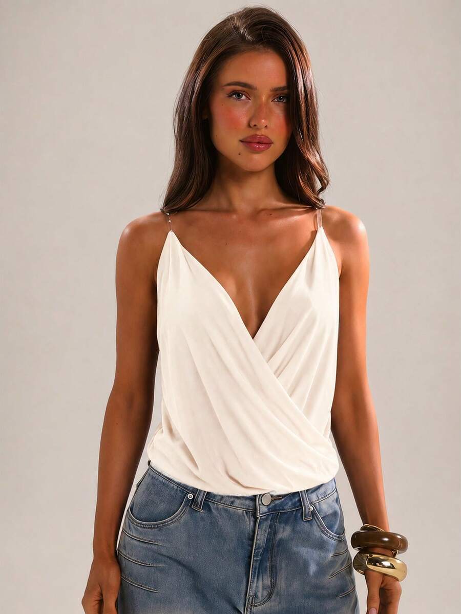 Women's black slim fit spaghetti strap camisole top with a plain design and wrap detail.