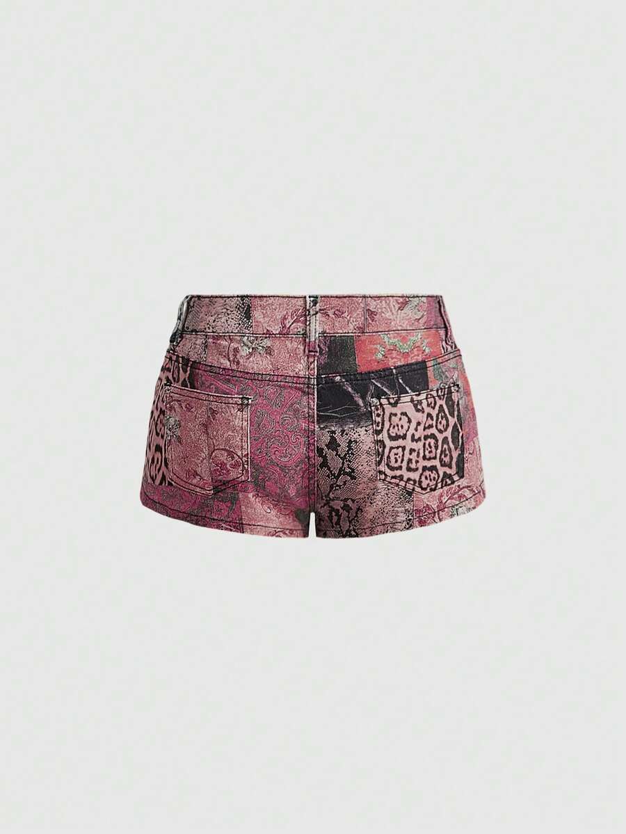 Vintage animal print ultra low waist mini shorts featuring button zipper closure, pockets, and regular fit.
