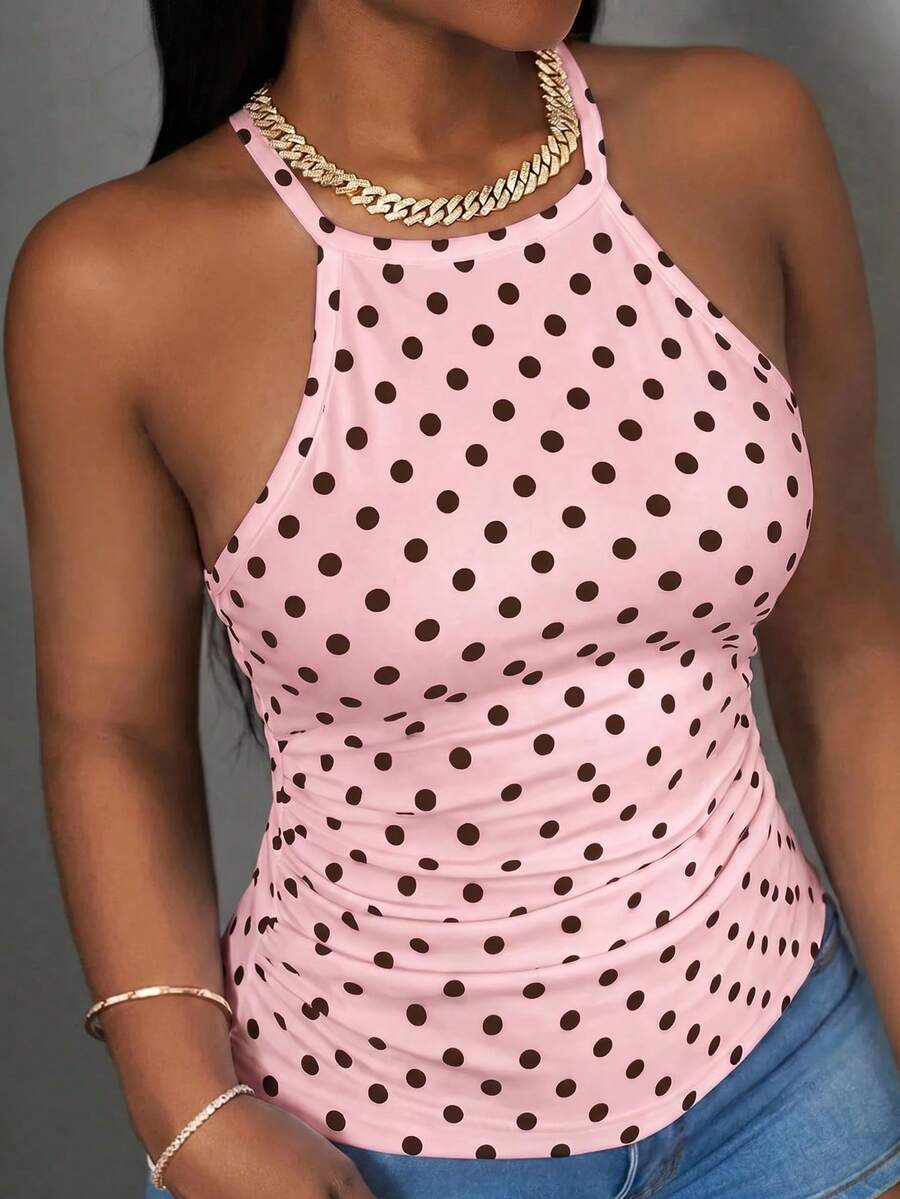 Multicolor women's graphic print halter tank top featuring a round neck, contrast binding, and backless design.