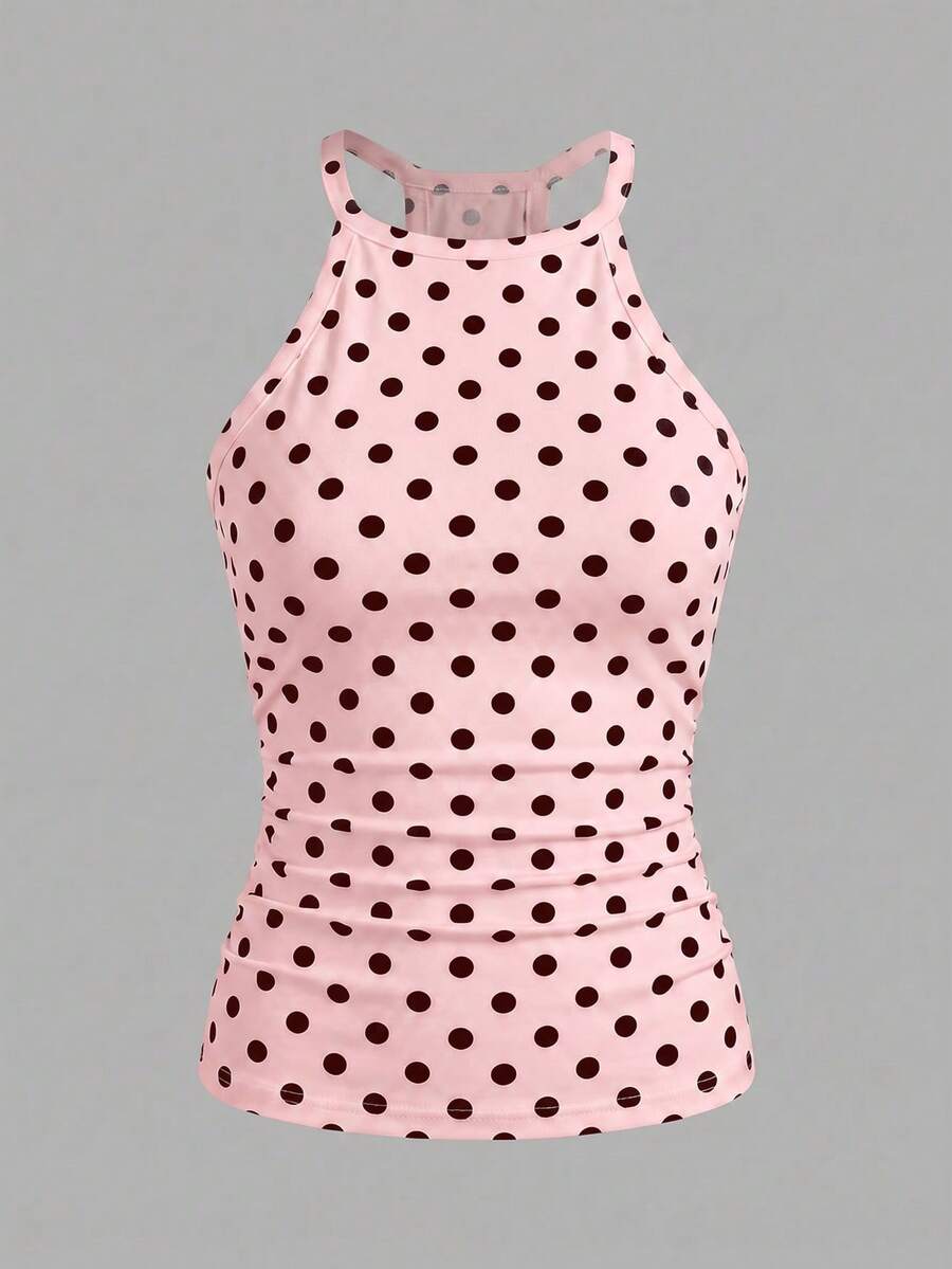 Multicolor women's graphic print halter tank top featuring a round neck, contrast binding, and backless design.