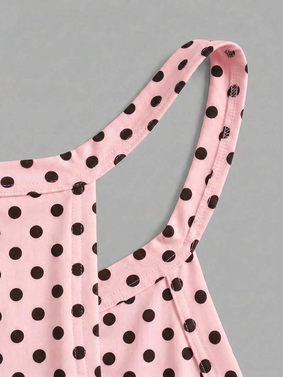 Multicolor women's graphic print halter tank top featuring a round neck, contrast binding, and backless design.