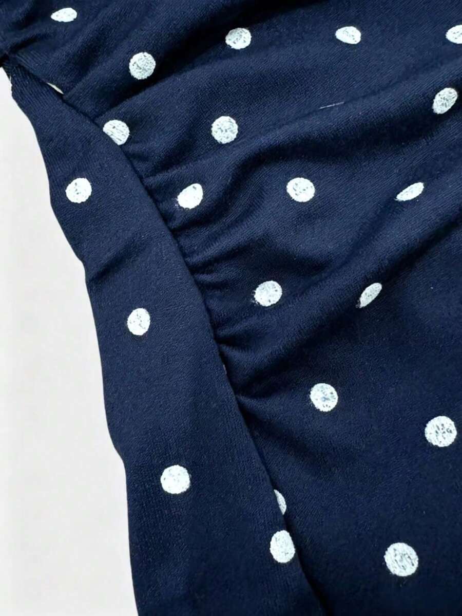 Women's cowl neck tie polka dot pleated tank blouse with ruched details and a regular fit
