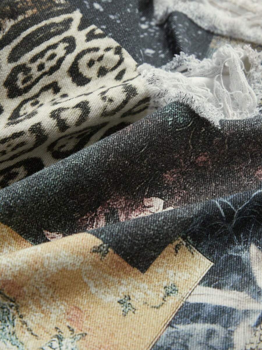 Women's loose wide-leg denim Bermuda shorts featuring vintage animal and paisley print with pockets and zipper fly.