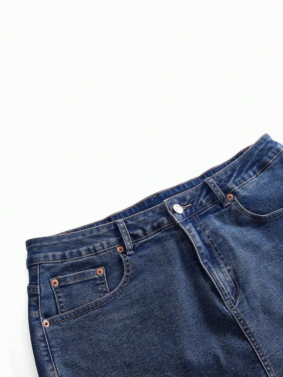 Front view of a women's plus size denim mini skirt with contrast lace trim and a fitted silhouette.