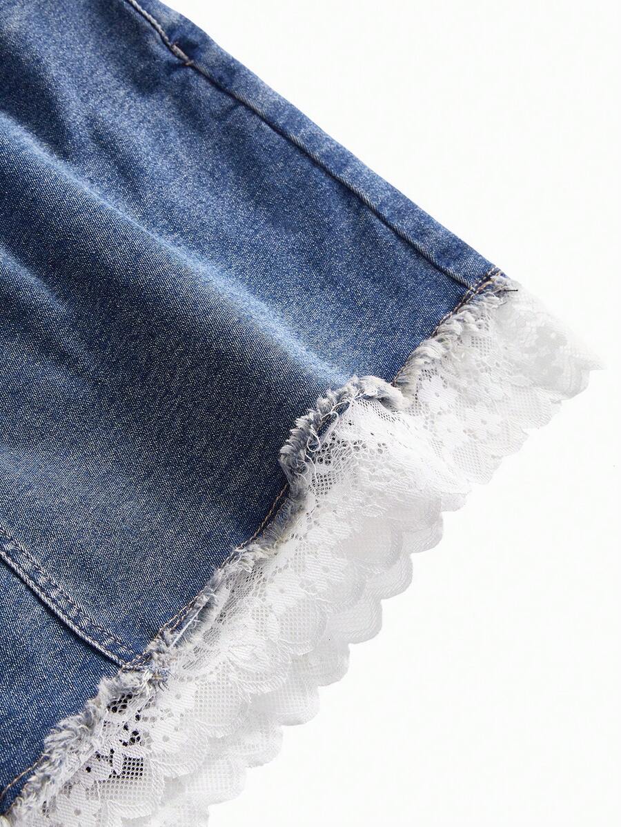 Front view of a women's plus size denim mini skirt with contrast lace trim and a fitted silhouette.