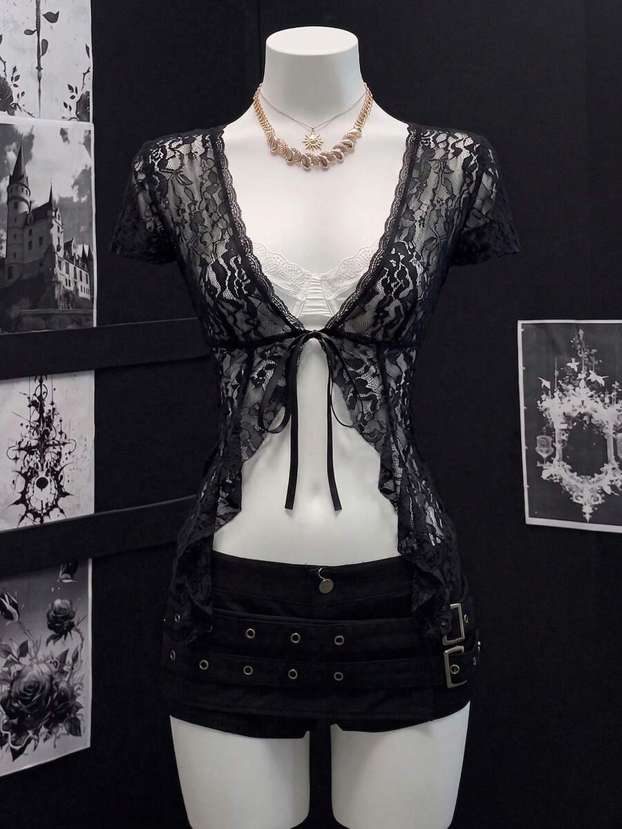 Women's semi-sheer deep V-neck top featuring cap sleeves, contrast lace trimming, and a lace-up front detail.