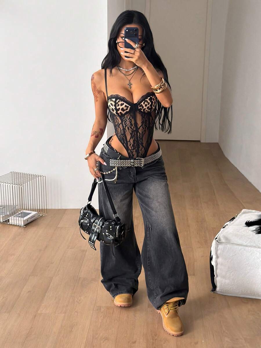 Fitted women's lace and mesh cami bodysuit with spaghetti straps.