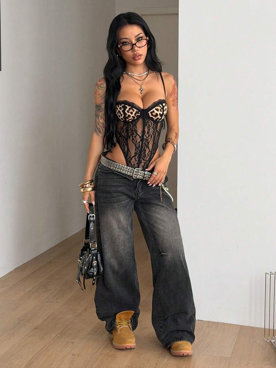 Fitted women's lace and mesh cami bodysuit with spaghetti straps.