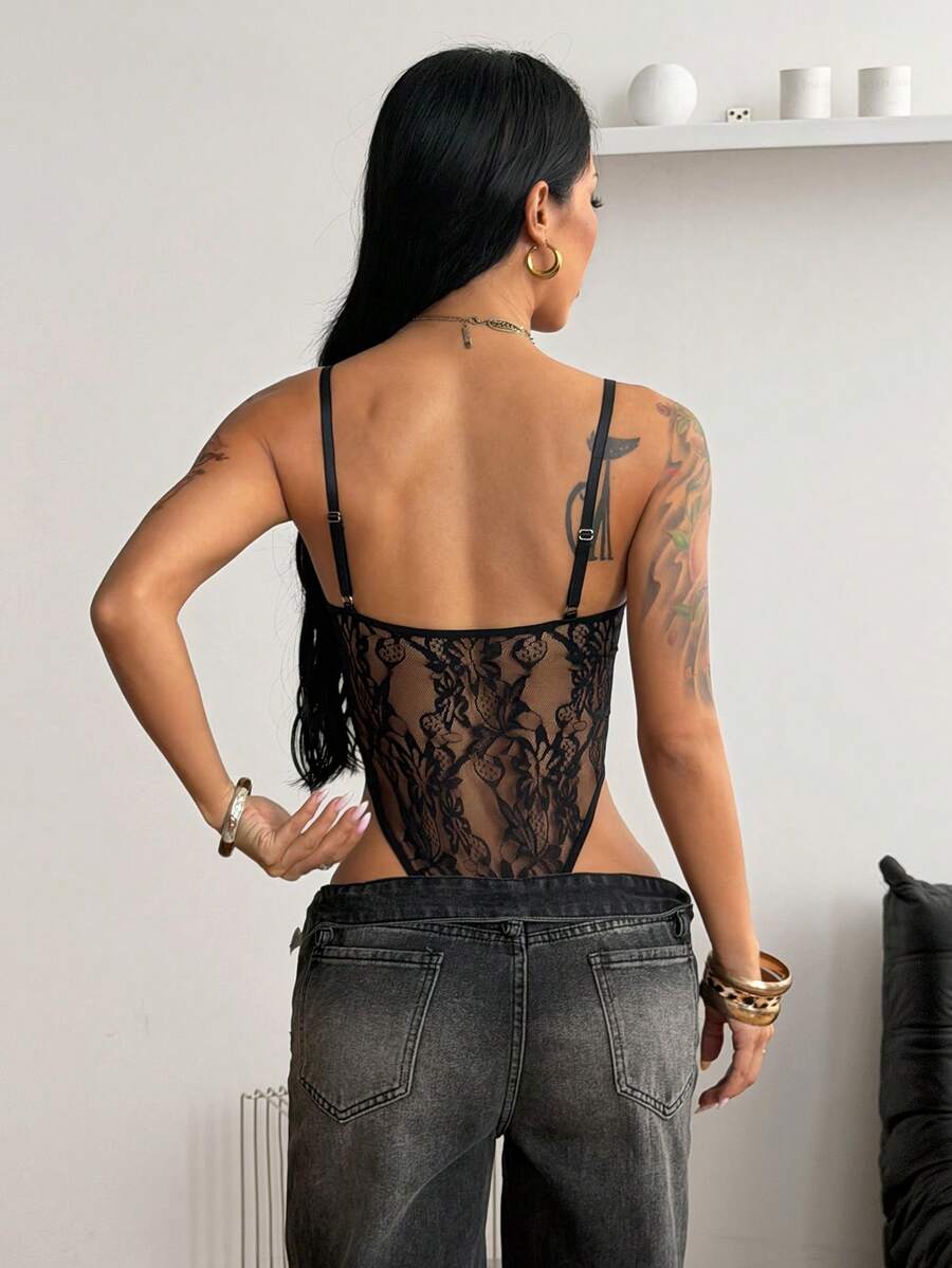 Fitted women's lace and mesh cami bodysuit with spaghetti straps.