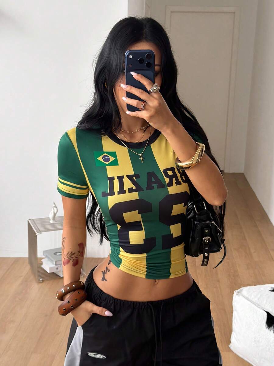 Women's slim fit short sleeve graphic jersey style top with contrast binding and round neckline