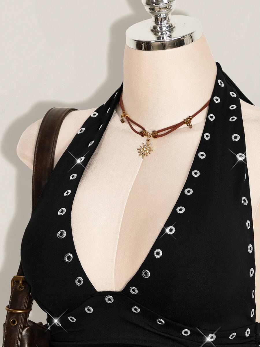 Women's backless halter babydoll tank top featuring a square neckline, slim fit silhouette, and a flared ruffle hem.