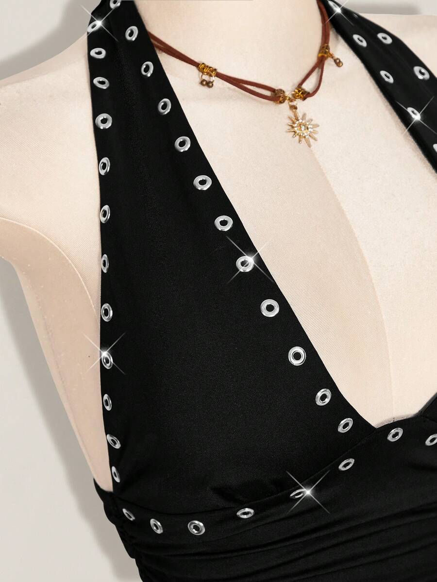 Women's backless halter babydoll tank top featuring a square neckline, slim fit silhouette, and a flared ruffle hem.