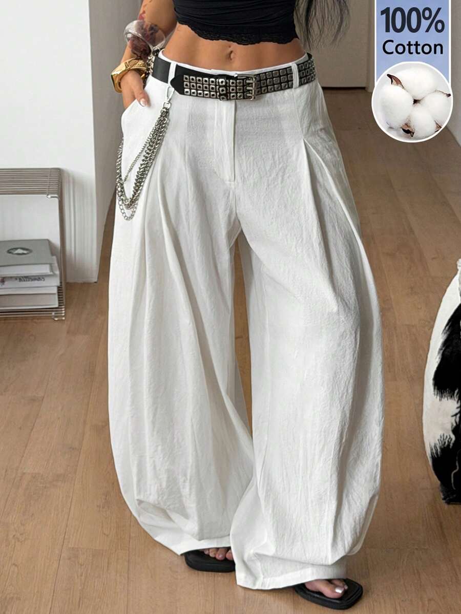 Casual black striped woven long pants for women featuring a low waist and loose fit design.