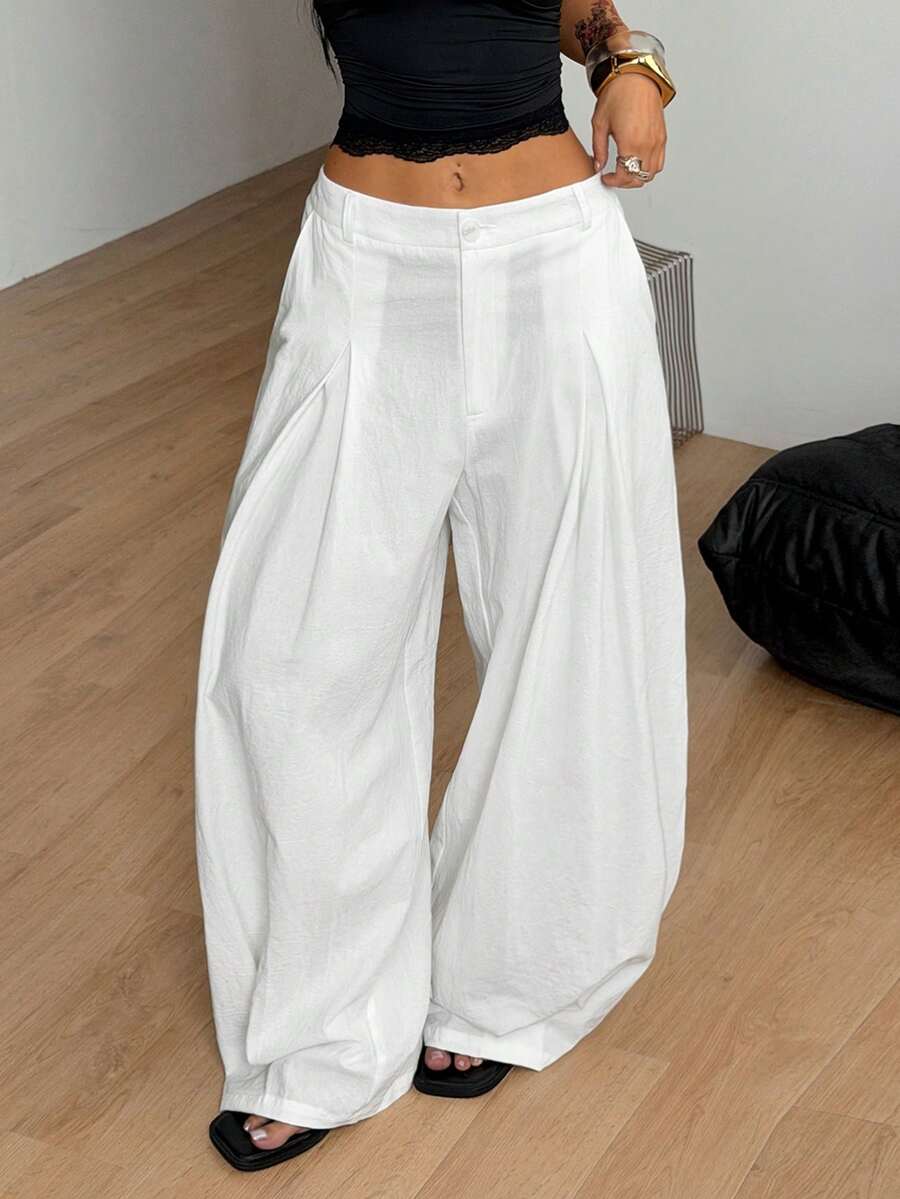 Casual black striped woven long pants for women featuring a low waist and loose fit design.