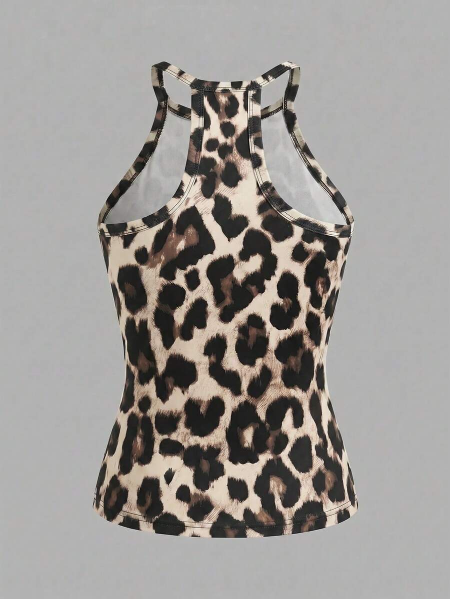 Multicolor women's graphic print halter tank top featuring a round neck, contrast binding, and backless design.