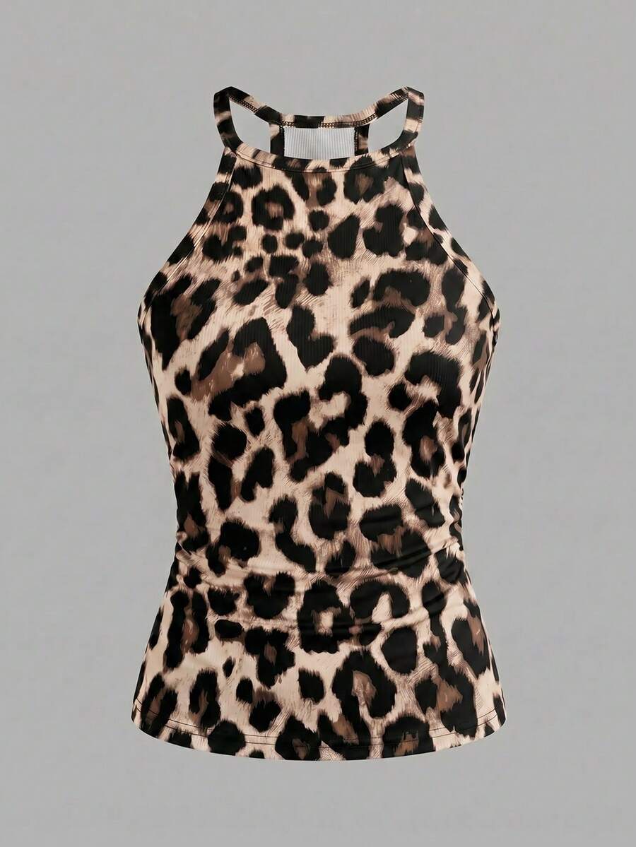 Multicolor women's graphic print halter tank top featuring a round neck, contrast binding, and backless design.