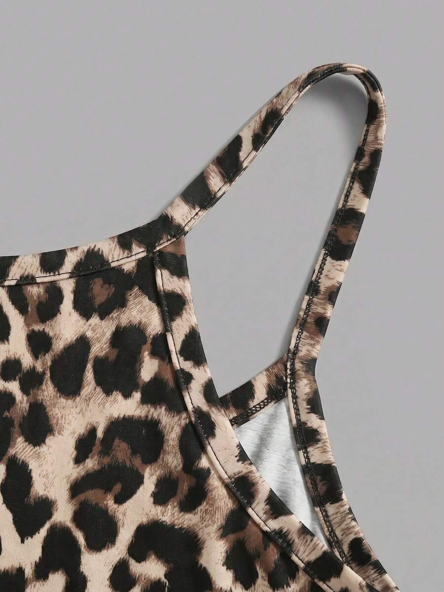 Multicolor women's graphic print halter tank top featuring a round neck, contrast binding, and backless design.